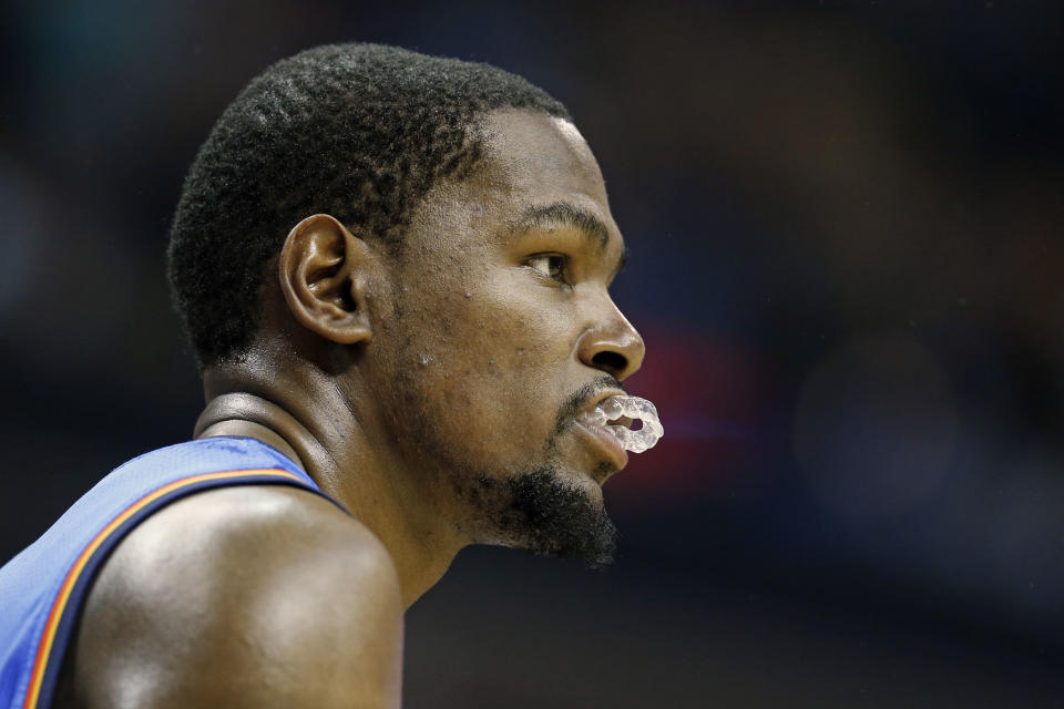 Oklahoma City Thunder forward Kevin Durant waits for play to resume against the Memphis Grizzlies in the fourth quarter of Game 3 of an opening-round NBA basketball playoff series Thursday, April 24, 2014, in Memphis, Tenn. The Grizzlies won 98-95 in overtime. (AP Photo/Mark Humphrey)