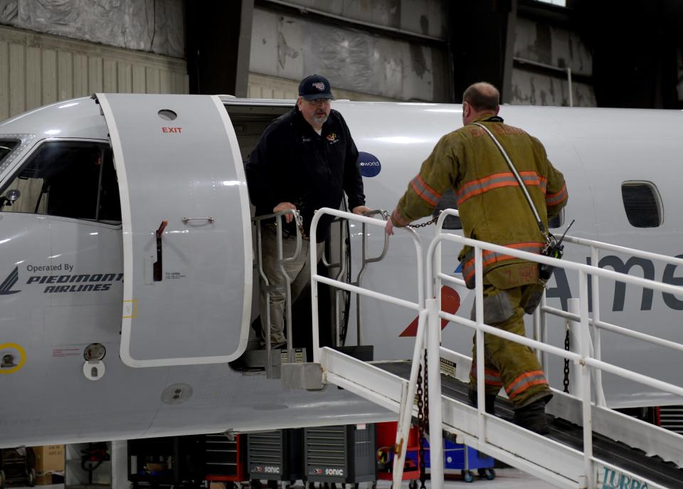 Volunteers play the part of injured passengers as Salisbury Regional Airport held it's Triennial Disaster Exercise Saturday, March 23, 2024, in Salisbury, Maryland.
