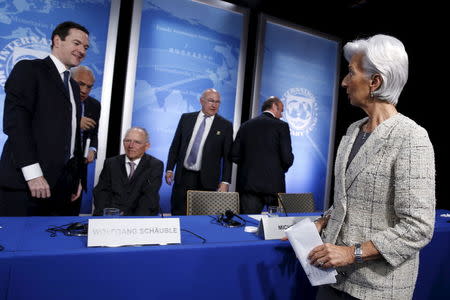 Britain's Chancellor of the Exchequer George Osborne (L-R), OECD Secretary General Jose Angel Gurria (obscured), Germany's Finance Minister Wolfgang Schaeuble, France's Finance Minister Michel Sapin, Spain's Finance Minister Luis de Guindos and International Monetary Fund (IMF) Managing Director Christine Lagarde depart after a news conference at the IMF/World Bank Spring Meetings in Washington April 14, 2016. REUTERS/Jonathan Ernst