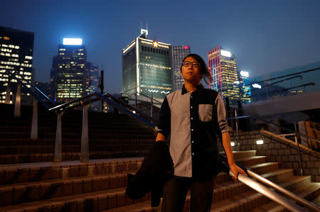 Louis Tan, Convenor of Hong Kong National Front poses for photo before interview at the financial Central district in Hong Kong, China December 7, 2017. REUTERS/Tyrone Siu