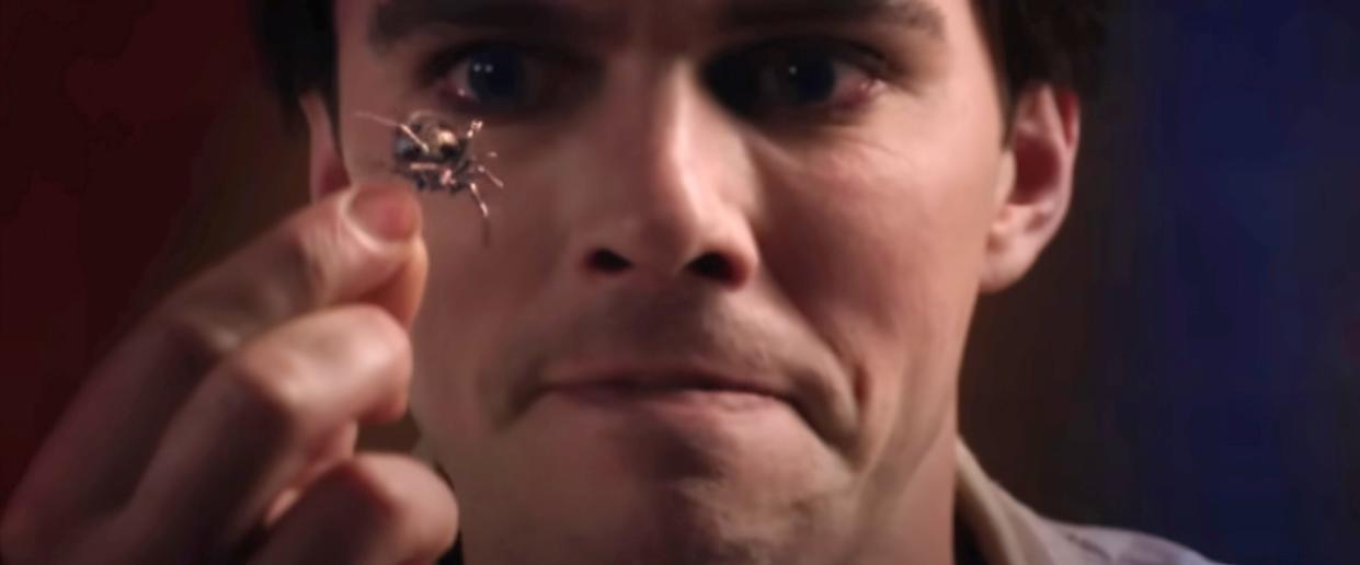 Nicholas Hoult eyes one of the many bugs he has to eat in the horror comedy, Renfield. (Photo: Universal/Courtesy Everett Collection)