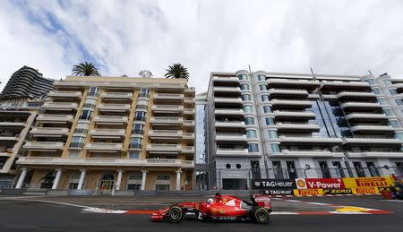 Ferrari Formula One driver Sebastian Vettel of Germany drives his car during the first free practice session at the Monaco Grand Prix May 21, 2015. REUTERS/Stefano Rellandini