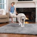 <p><strong>Gorilla Grip</strong></p><p>amazon.com</p><p><strong>$34.99</strong></p><p>This ultra-plush rug is safe to be machine-washed and dried for the inevitable mess your pets will make, and it's also <strong>so soft that your cats and dogs will have a new favorite spot to lounge.</strong> Even better, it has grips on the underside to prevent it from sliding around as your animals run over it. It comes in eight sizes, ranging from 2' x 4' to 7.5' x 10', and numerous colors.</p>