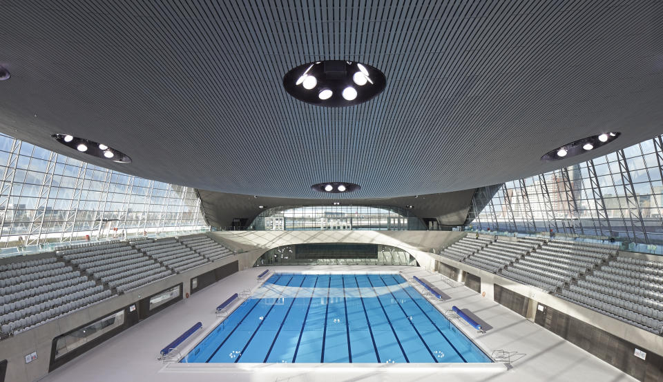 London Aquatics Centre, after the 2012 Games, London, United Kingdom. Architect: Zaha Hadid Architects, 2011. Overall view of competition pool and spectator stands. (Photo by: Hufton+Crow/View Pictures/Universal Images Group via Getty Images)