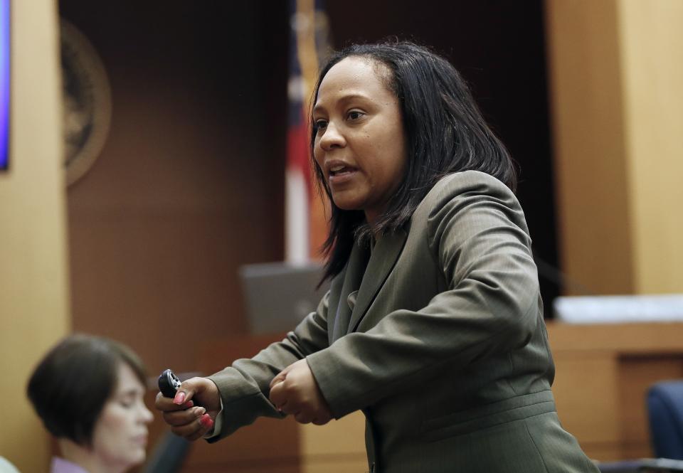 FILE - In this Wednesday, Aug. 24, 2016, file photo, Fulton County Deputy District Attorney Fani Willis makes her closing arguments during a trial in Atlanta. Willis, entered the national spotlight Wednesday, Feb. 10, 2021, when letters to top state officials revealed her office is investigating whether illegal attempts were made to influence the state's 2020 elections. (AP Photo/John Bazemore, File)