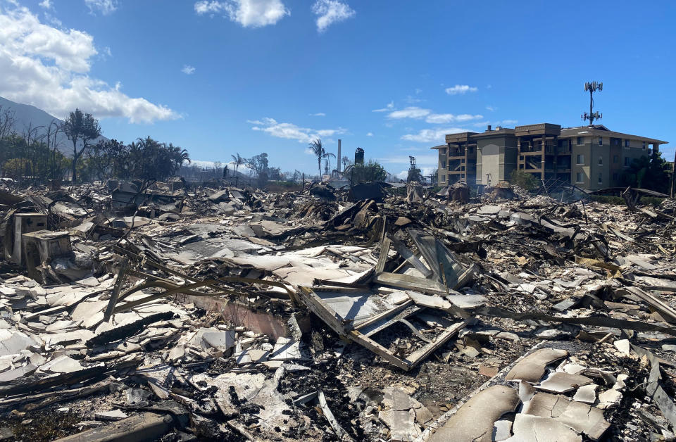 Destroyed buildings and homes are pictured in the aftermath of a wildfire in the city of Lahaina on the Hawaiian island of Maui on Aug. 11, 2023.  / Credit: PAULA RAMON/AFP via Getty Images