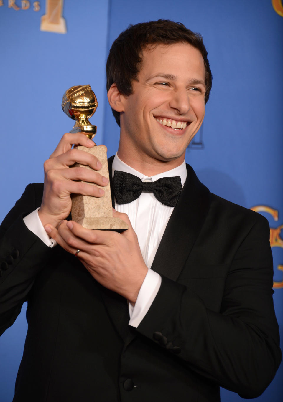 Andy Samberg poses in the press room with the award for best actor in a television series - comedy or musical for "Brooklyn Nine - Nine" at the 71st annual Golden Globe Awards at the Beverly Hilton Hotel on Sunday, Jan. 12, 2014, in Beverly Hills, Calif. (Photo by Jordan Strauss/Invision/AP)