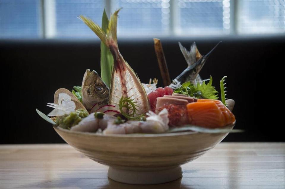 A 15-piece sashimi mix, on ice, pickled wasabi and other accompaniments is ready to serve at Kru Contemporary Japanese Cuisine in 2017. Co-owner/chef Billy Ngo pushed for Sacramento’s inclusion in the Michelin Guide.