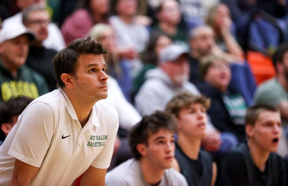 West Salem head coach Travis Myers watches the game against Sprague from the sidelines on Friday, Feb. 2, 2024 at Sprague High School in Salem, Ore.