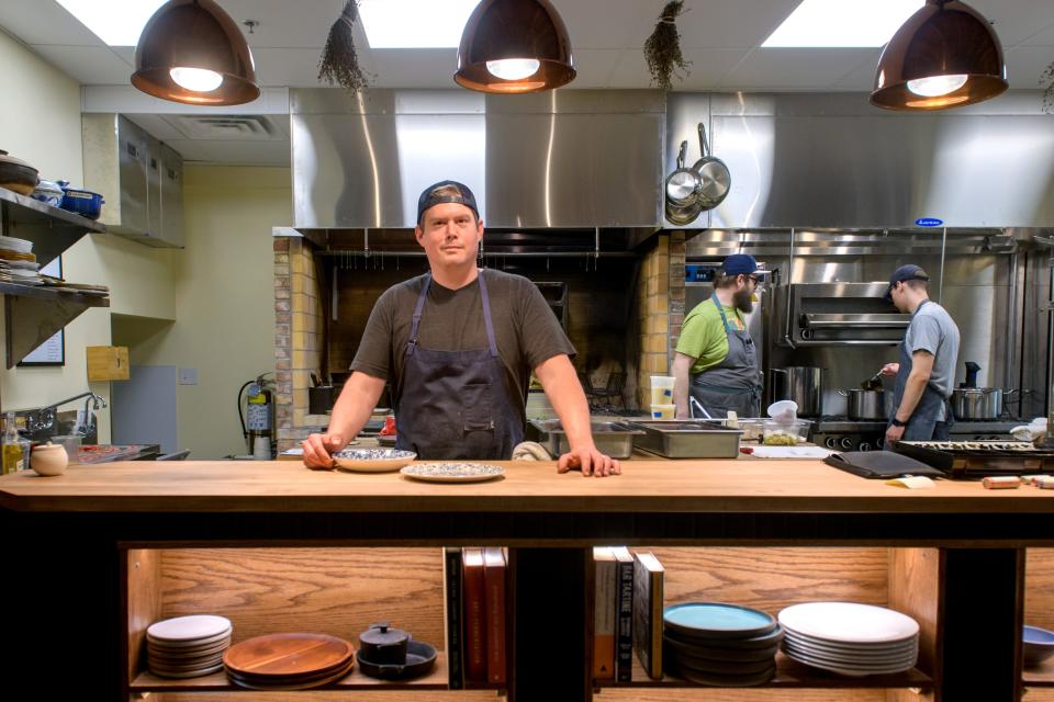 Cody Scogin, owner of Ardor Breads and Provisions at 301 W. Water Street on the Peoria riverfront, stands in the new kitchen area of his expanded bakery and restaurant space. The popular eatery has taken over the space formerly occupied by Nailon's Plumbing and Supplies and expanded from a small bakery to a full-fledged restaurant.