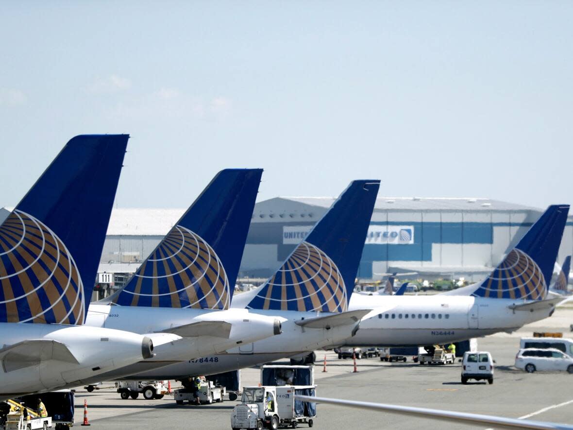 United Airlines says it has removed an aircraft for deep cleaning after several passengers complained of nausea on board a Vancouver-Houston flight. (Julio Cortez/The Associated Press - image credit)