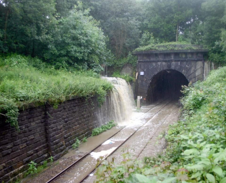 A view of floodwater entering the Horsforth end of Bramhope Tunnel after Moseley Beck had burst its banks in  the summer of 2008. (Photo: Leeds Libraries, www.leodis.net)