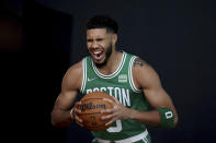 Boston Celtics forward Jayson Tatum yells for a photo during the Boston Celtics Media Day, Monday, Sept. 27, 2021, in Canton, Mass. (AP Photo/Mary Schwalm)