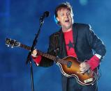 British rock legend Paul McCartney performs at halftime of Super Bowl XXXIX at Alltel Stadium in Jacksonville, FL. (ROBERTO SCHMIDT/AFP via Getty Images)