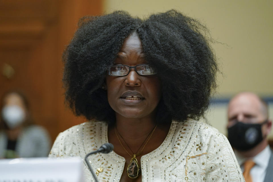 Zeneta Everhart, whose son Zaire Goodman, 20, was shot in the neck during the Buffalo Tops supermarket mass shooting and survived, testifies during a House Committee on Oversight and Reform hearing on gun violence on Capitol Hill in Washington, Wednesday, June 8, 2022. (AP Photo/Andrew Harnik, Pool)