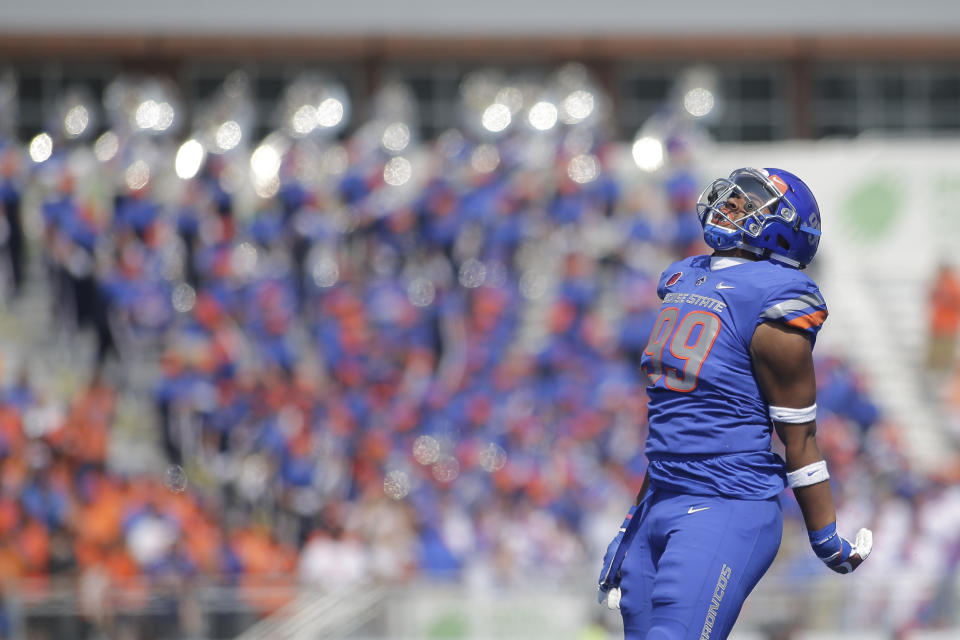 Boise State defensive end Curtis Weaver (99) led the Mountain West in sacks in 2017. (AP Photo/Otto Kitsinger)