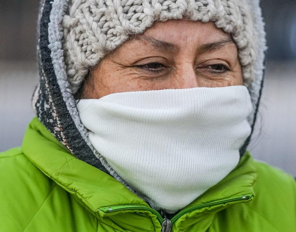 Antonella Chirboga takes a morning walk as a cold front sweeps across downtown Austin Monday, Jan. 15, 2024. The sudden drop in temperature and brisk wind foreshadow the challenges Antonella will face throughout the day.