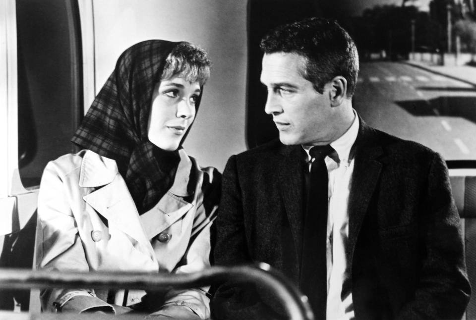 Julie Andrews talking to Paul Newman on a bus.