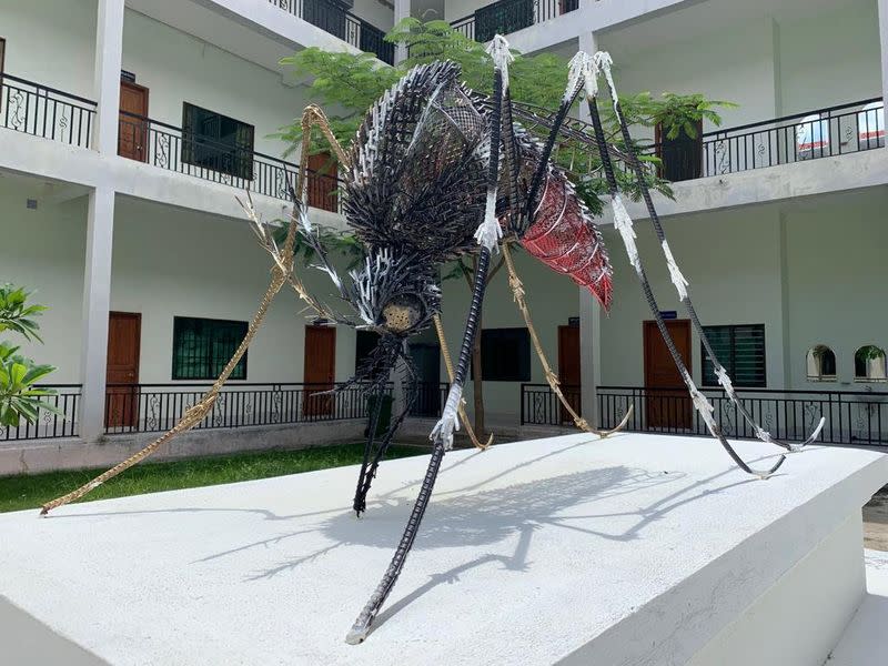 A giant sculpture of a mosquito is pictured in the courtyard of scientist Jessica Manning’s lab space, near Phnom Penh