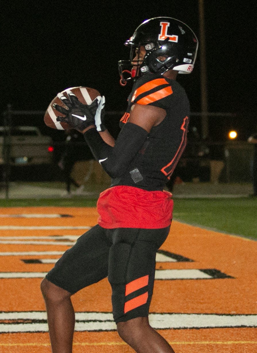 Lakeland High School's Tyler Williams (10) scores a touchdown reception against Kathleen High School during the first half at Bryant Stadium in Lakeland Friday night. October 29, 2021. MICHAEL WILSON | LEDGER CORRESPONDENT