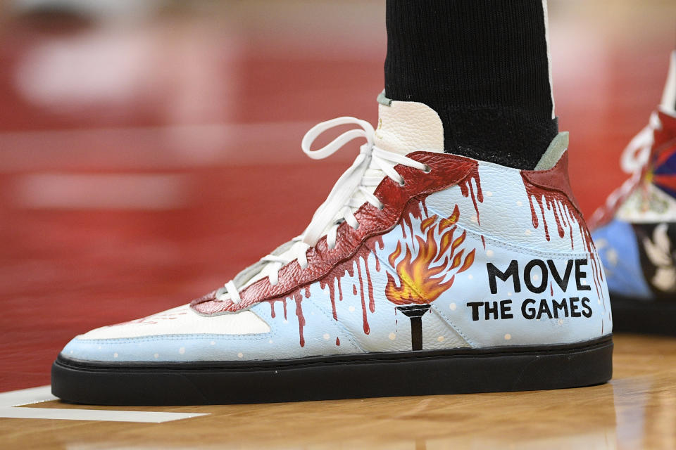 The shoes of Boston Celtics center Enes Kanter as seen during the first half of an NBA basketball game against the Washington Wizards, Saturday, Oct. 30, 2021, in Washington. (AP Photo/Nick Wass)