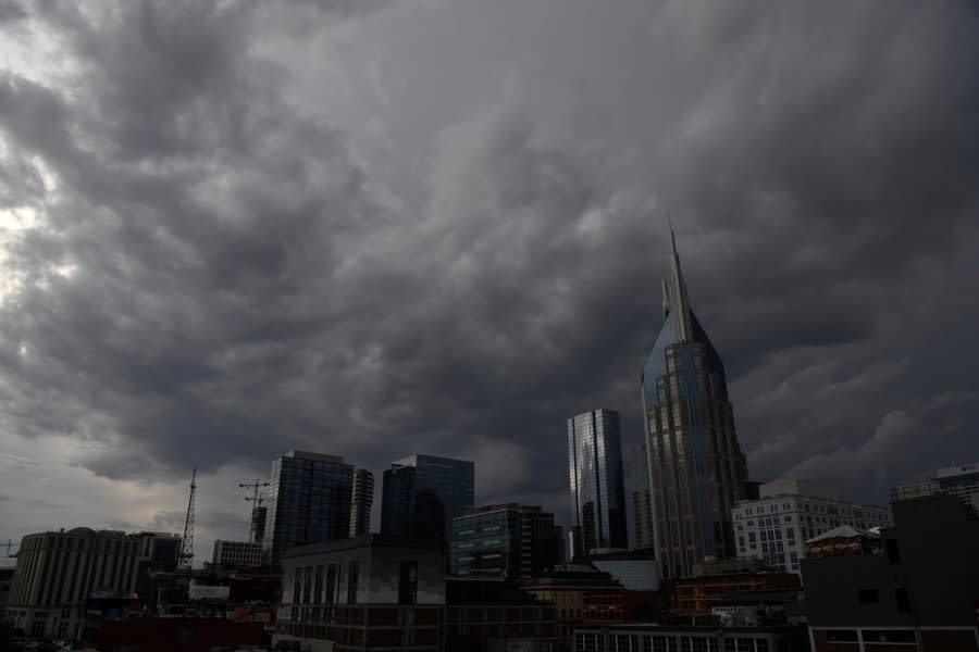A storm front approaches downtown Nashville, Tenn., which spawned an apparent tornado north of the city, Saturday, Dec. 9, 2023. (Nicole Hester/The Tennessean via AP)