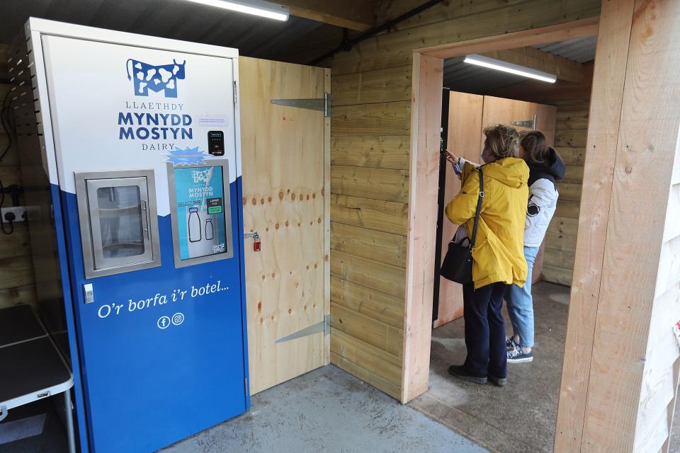 Einion and Elliw Jones of Mynydd Mostyn Dairy near Mostyn have set up a drive thru for milk produced on their farm along with milkshakes and coffee. Photo by Ian Cooper