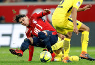 Soccer Football - Ligue 1 - LOSC Lille vs Paris St Germain - Stade Pierre-Mauroy, Lille, France - February 3, 2018 Lille’s Luiz Araujo in action with Paris Saint-Germain’s Dani Alves REUTERS/Charles Platiau