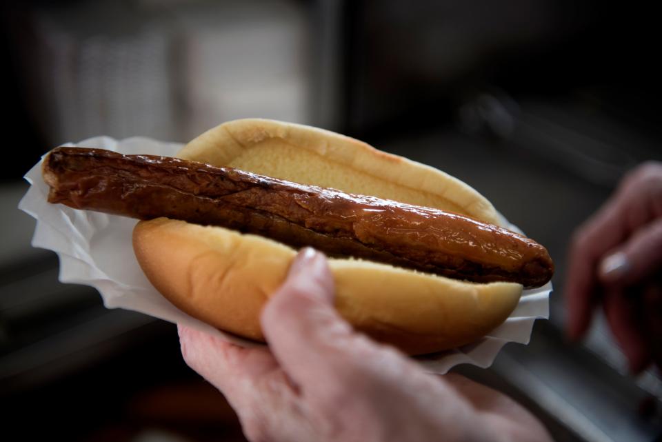 The hot dog cart is outside of Karl Ehmer Quality Meats in Hillsdale.