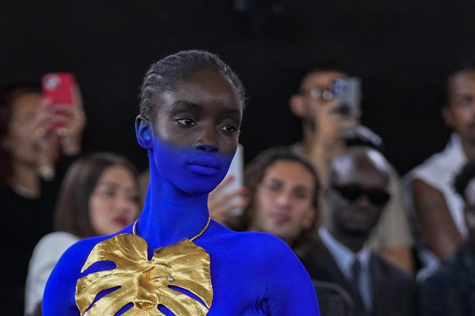 A model wears a creation for the Schiaparelli Haute Couture Fall/Winter 2023-2024 fashion collection presented in Paris, Monday, July 3, 2023. (AP Photo/Michel Euler)