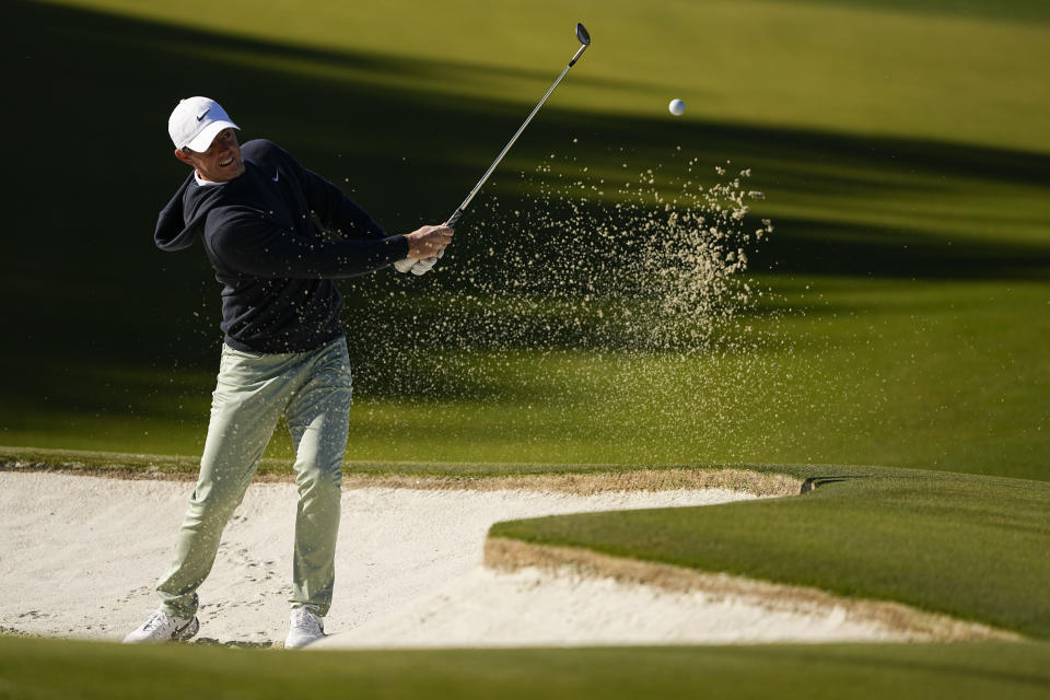 Rory McIlroy, of Northern Ireland, hits from the bunker on the 14th hole during first round of the Wells Fargo Championship golf tournament at the Quail Hollow Club on Thursday, May 4, 2023, in Charlotte, N.C. (AP Photo/Chris Carlson)