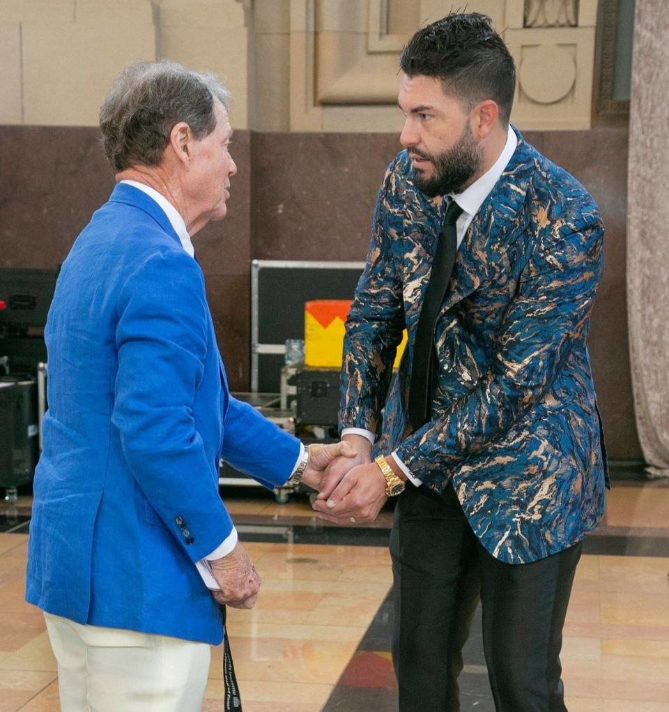 Eric Hosmer got some tips on his golf swing from Tom Watson on Sunday, May 19, 2024, before the Missouri Sports Hall of Fame enshrinement ceremony at Union Station.