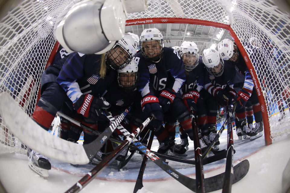 <p>Players from the United States pose for the camera before the semifinal round of the women’s hockey game against Finland at the 2018 Winter Olympics in Gangneung, South Korea, Monday, Feb. 19, 2018. (Matt Slocum/Pool Photo via AP) </p>