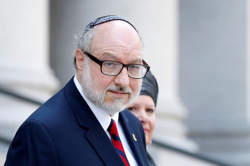 FILE PHOTO: Jonathan Pollard, a former U.S. Navy intelligence officer convicted of spying for Israel, exits following a hearing at the Manhattan Federal Courthouse in New York