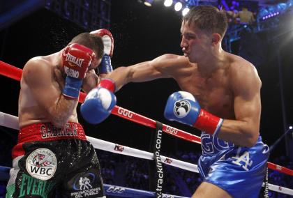 Gennady Golovkin hits Marco Antonio Rubio with a right en route to winning in the second round. (AP)