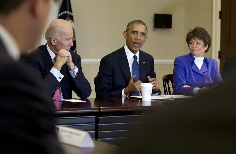 President Barack Obama, joined by Vice President Joe Biden, left, and Senior White House Adviser Valerie Jarrett, right, speaks during a Democratic Governors Association Meeting in the Eisenhower Executive Office Building on the White House campus in Washington, Friday, Feb. 19, 2016. (AP Photo/Carolyn Kaster)