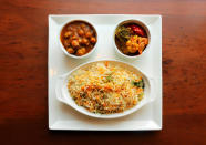 <p>Naan with Dal Makhani - 496.8 calories</p><p>Biryani rice with chana masala and jaipuri - 494 calories</p><p>Tandoori fish tikka with salad - 420.7 calories</p>