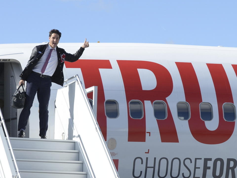 Liberal leader Justin Trudeau boards his campaign plane in Ottawa on Sunday, September 29, 2019. (Ryan Remiorz/The Canadian Press via AP)