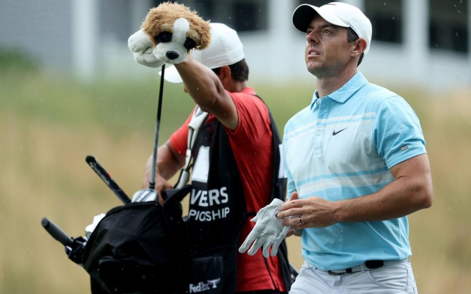 Rory McIlroy walks towards the green - GETTY IMAGES