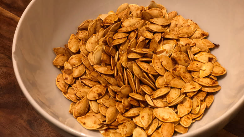 Toasted squash seeds in bowl