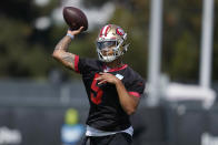 San Francisco 49ers quarterback Trey Lance throws a pass at NFL football training camp in Santa Clara, Calif., Wednesday, July 28, 2021. (AP Photo/Jeff Chiu)