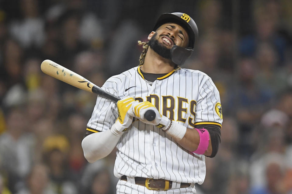 Fernando Tatis Jr. will miss an extended portion of the MLB regular season after fracturing his wrist this offseason.  (Photo by Denis Poroy/Getty Images)