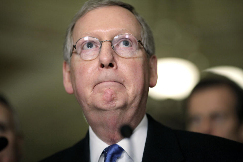 Senate Minority Leader Mitch McConnell of Ky. talks to reporters on Capitol Hill in Washington, Tuesday, Feb. 10, 2009, after the Senate passed the stimulus bill.  (AP Photo/J. Scott Applewhite)