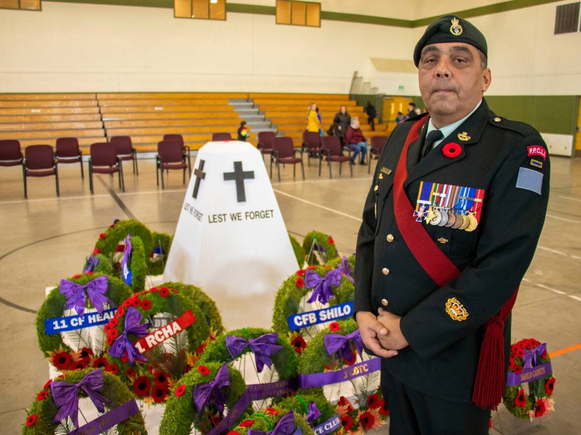 Master Warrant Officer Sheldon Quinn attends the the CFB Shilo Remembrance Day service on Friday, Nov. 11, 2022 at the gymnasium in the Multi-Purpose Training Facility. (Chelsea Kemp/CBC - image credit)