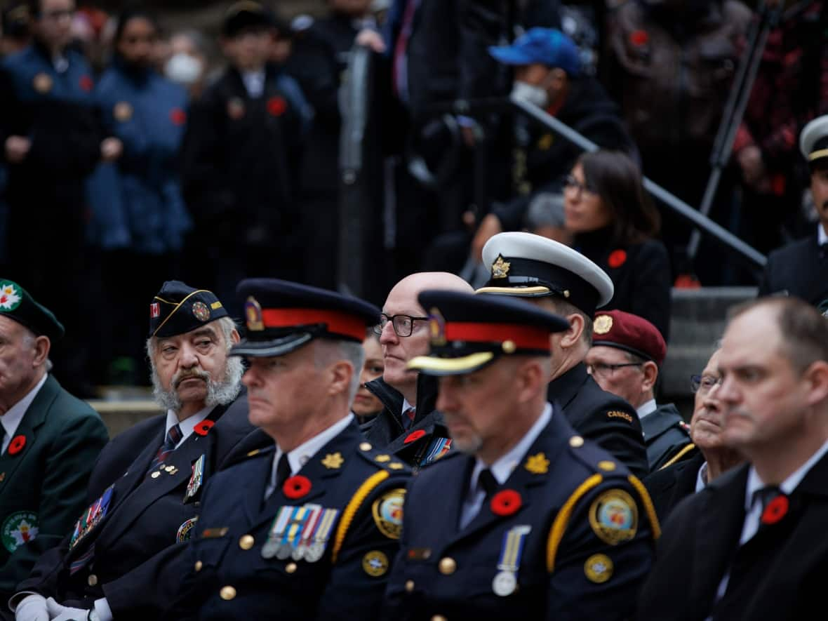 Veterans take part in a Remembrance Day service at the cenotaph at Old City Hall, in Toronto,  on Nov. 11, 2022. (Evan Mitsui/CBC - image credit)