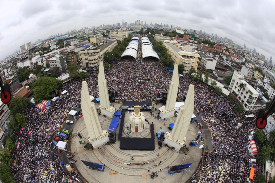 Anti-government protesters rally at the Democracy Monument in Bangkok, Thailand, Nov. 24, 2013. (AP Photo/Siam 360)