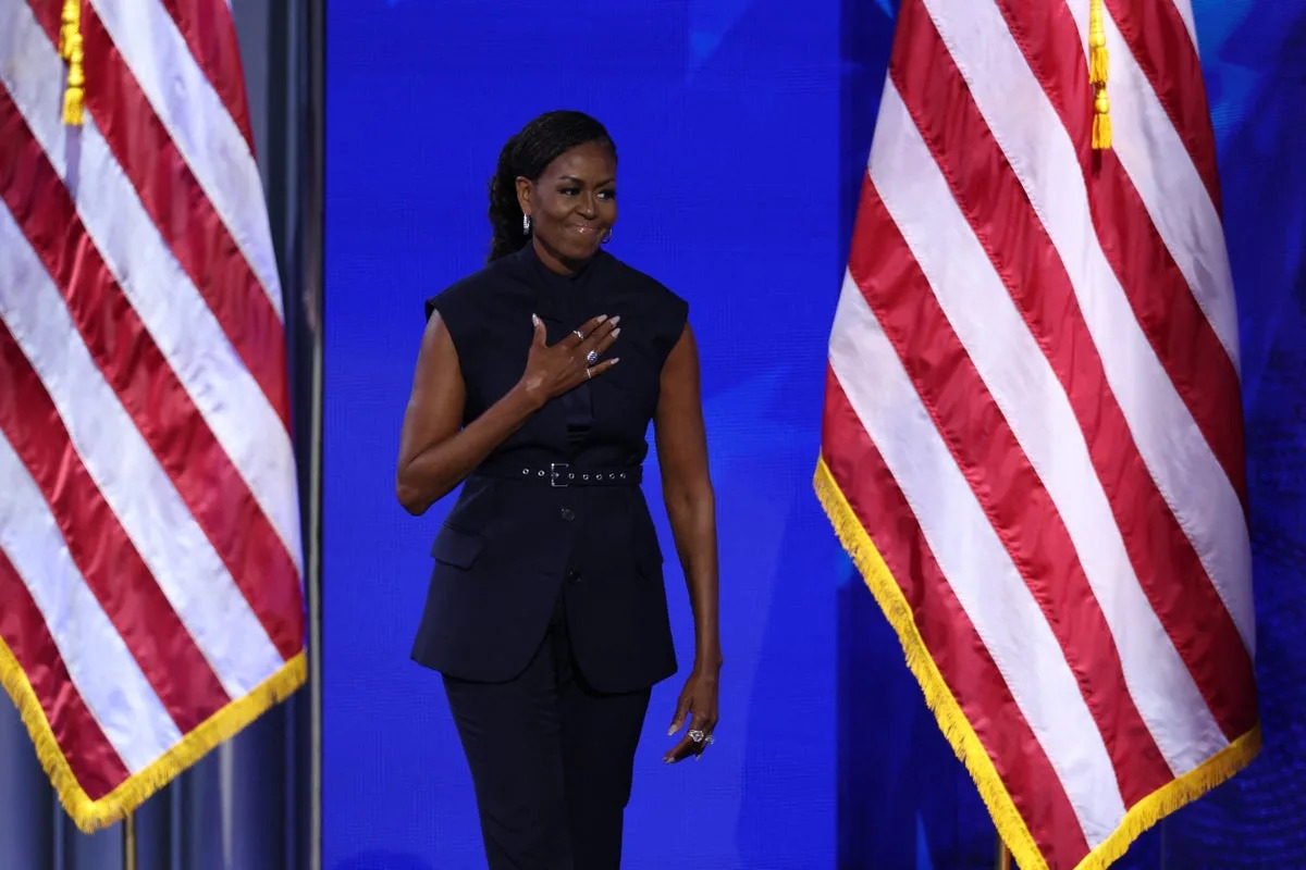 Michelle Obama takes the stage during Day two of the Democratic National Convention in Chicago on August 20 (REUTERS)