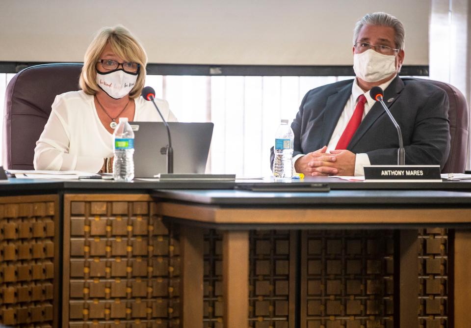 Superintendent Jennifer Gill, left, proposes District 186’s Return to Learn plan that will include universal masking during a Springfield District 186 Board of Education meeting along with Board President Anthony Mares, right, at the District 186 headquarters in Springfield, Ill., Monday, August 2, 2021. [Justin L. Fowler/The State Journal-Register] 