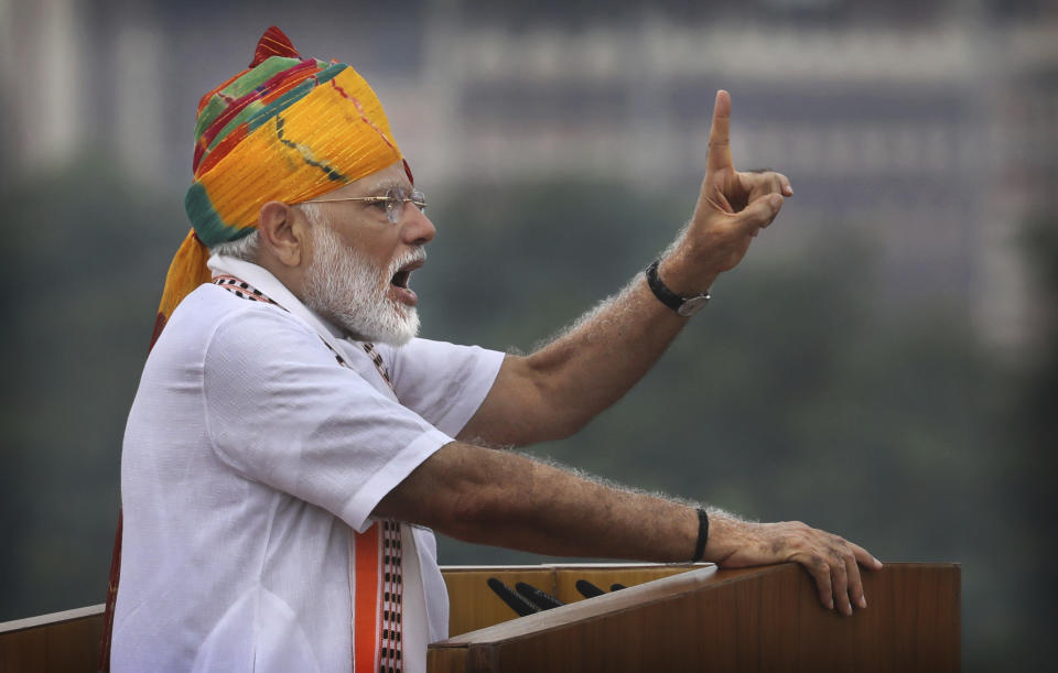 Indian Prime Minister Narendra Modi addresses to the nation on the country's Independence Day from the ramparts of the historical Red Fort in New Delhi, India, Thursday, Aug. 15, 2019. Modi said that stripping the disputed Kashmir region of its statehood and special constitutional provisions has helped unify the country. Modi gave the annual Independence Day address from the historic Red Fort in New Delhi as an unprecedented security lockdown kept people in Indian-administered Kashmir indoors for an eleventh day. (AP Photo/Manish Swarup)