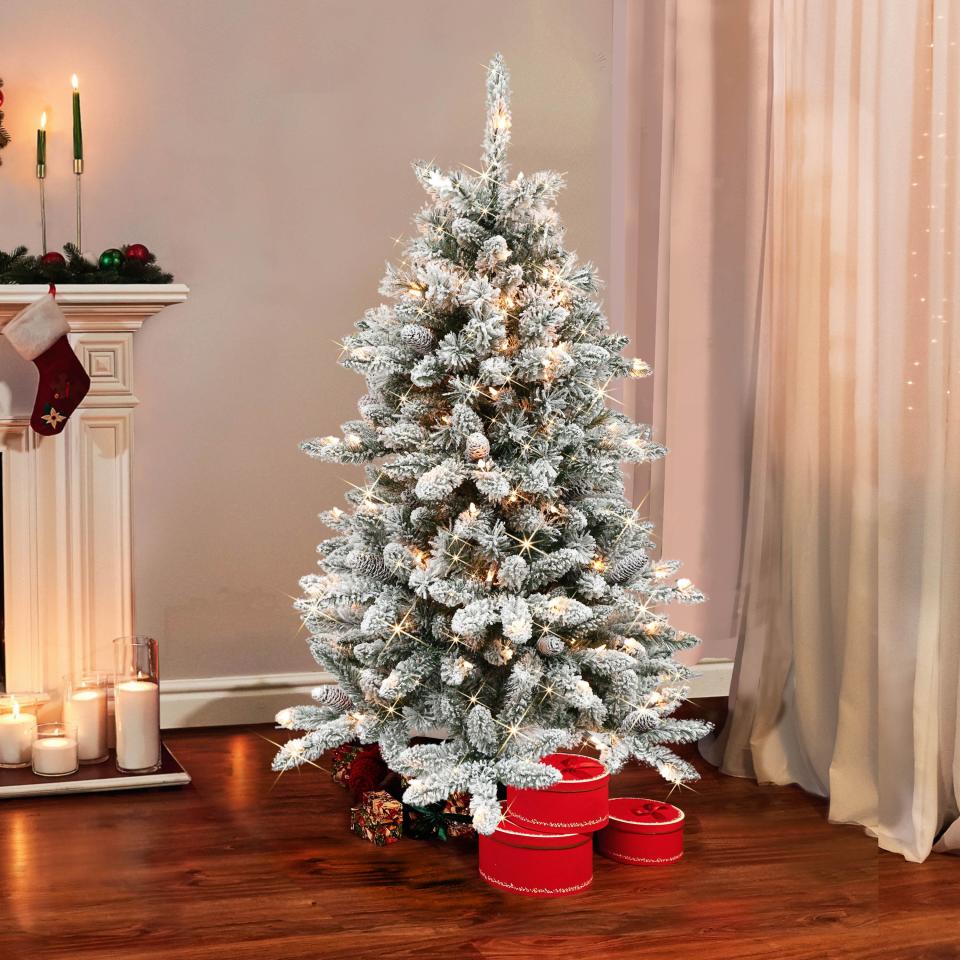 7) Green Artificial Fir Flocked Christmas Tree